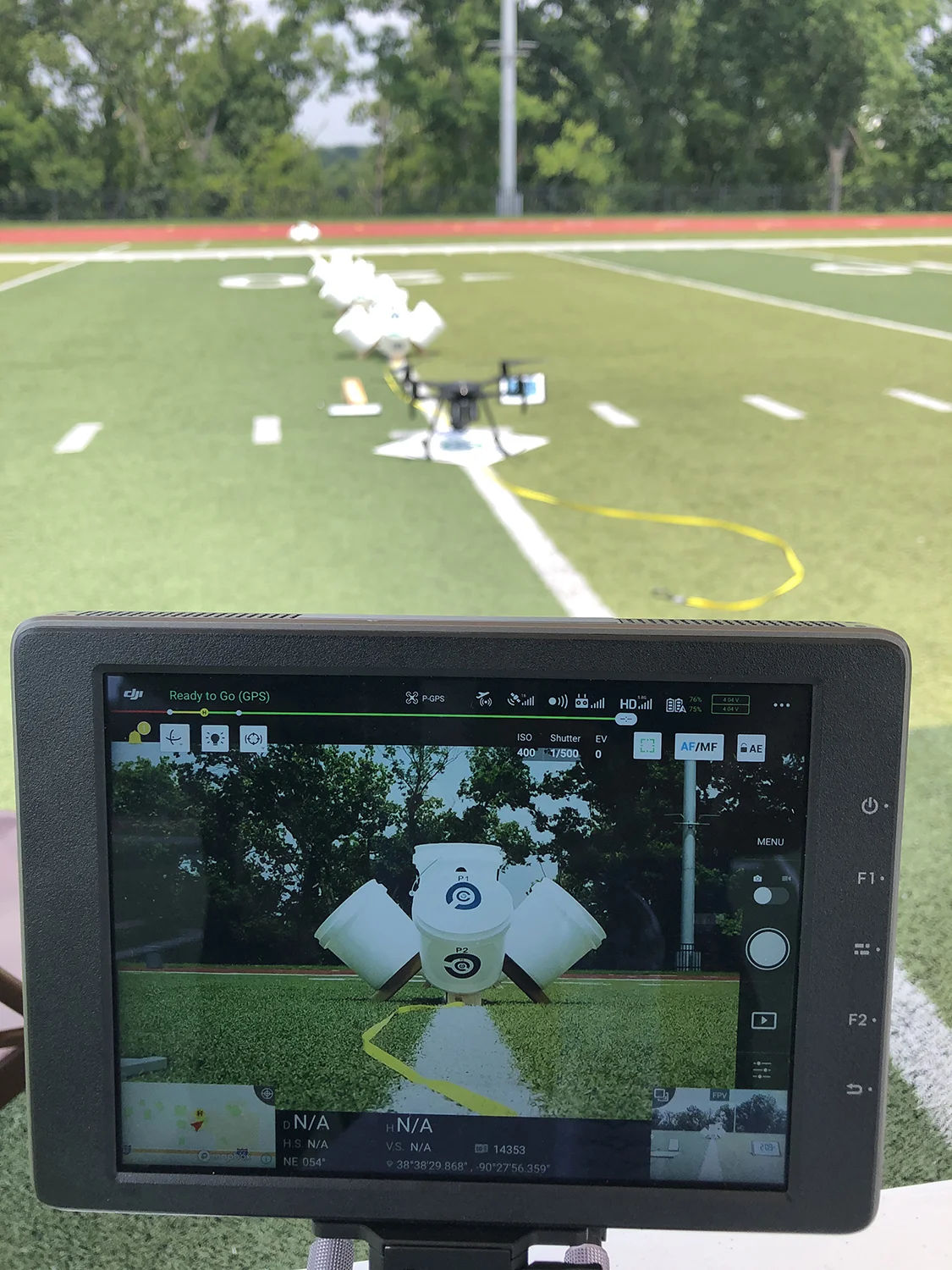 Drone controller displaying a bucket target during a field exercise